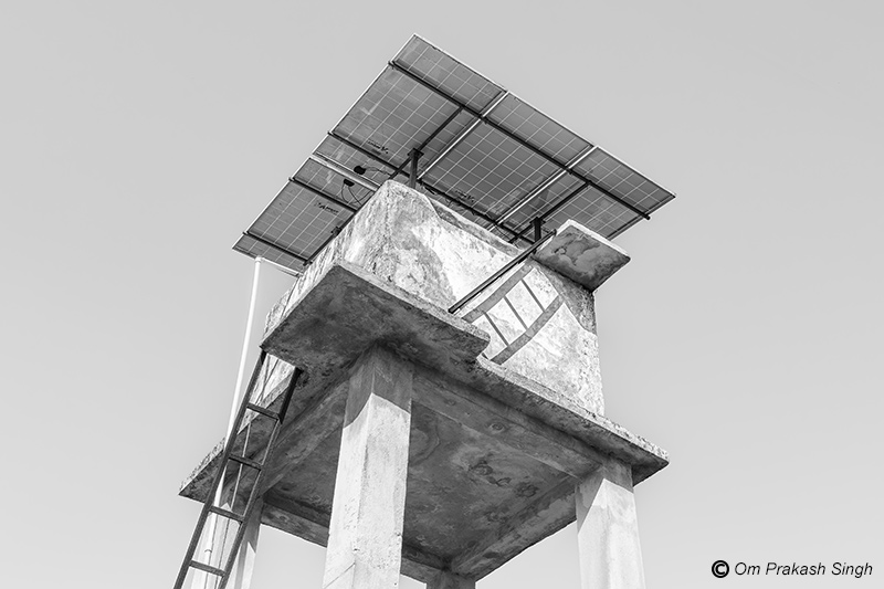 An RCC overhead tank in a rural SVS that lacks a cover on top and a facility for internal cleaning in Seraikela-Kharsawan district, Jharkhand, India